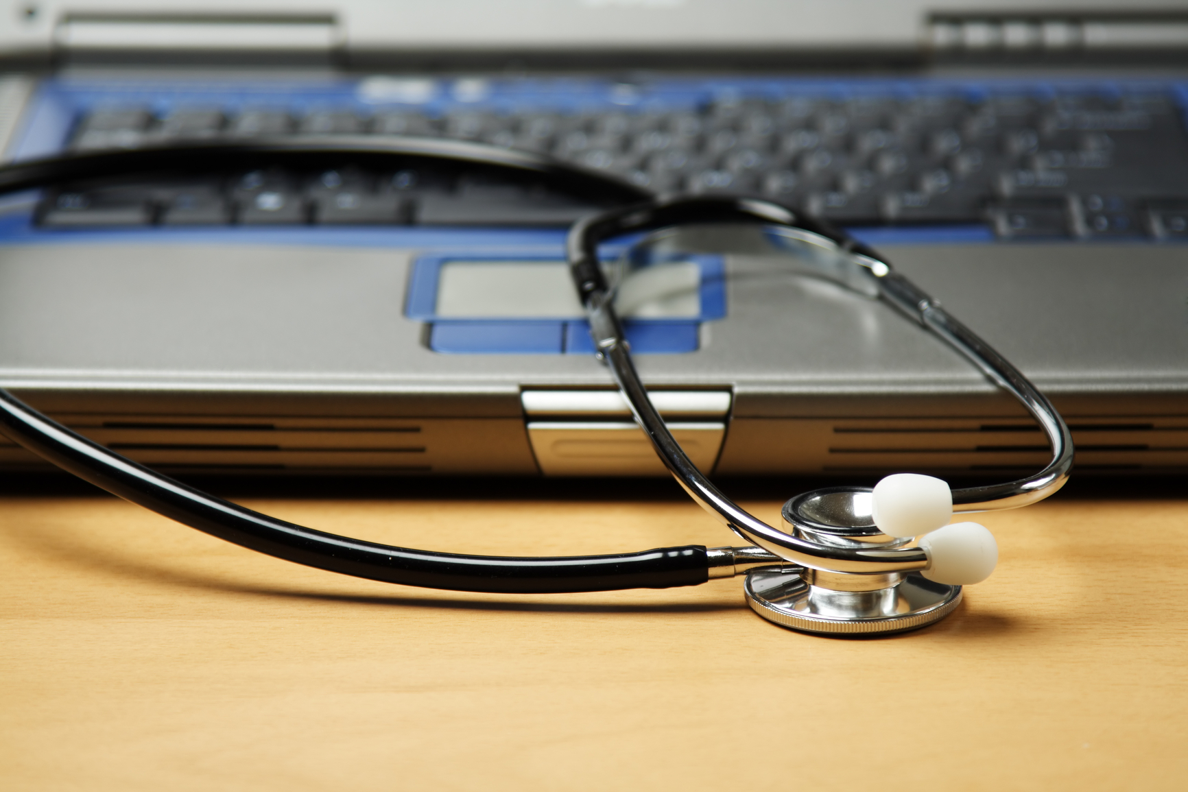 health care laptop with stethoscope